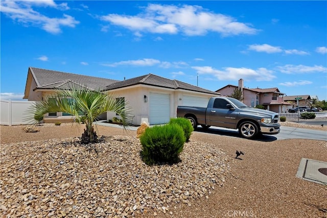 view of property exterior with a garage