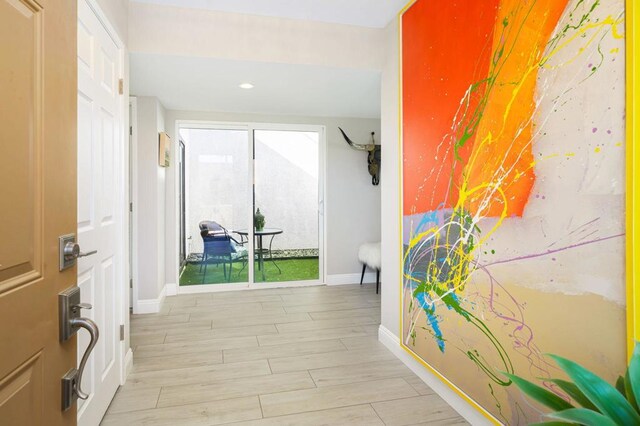 hallway featuring light hardwood / wood-style floors