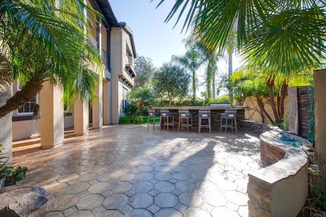 view of patio featuring a bar