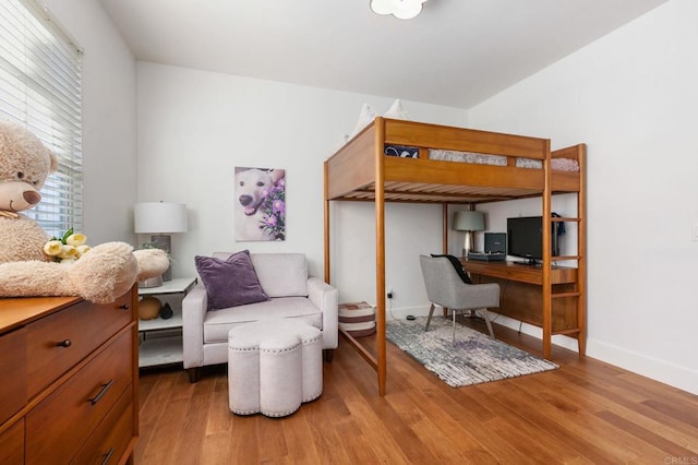 bedroom featuring hardwood / wood-style floors