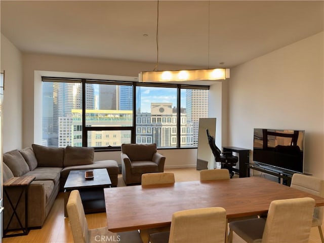 dining room featuring light hardwood / wood-style floors