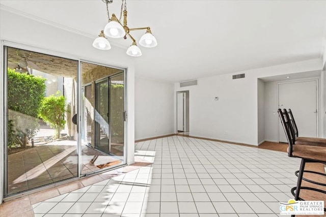 interior space with light tile patterned floors and a notable chandelier