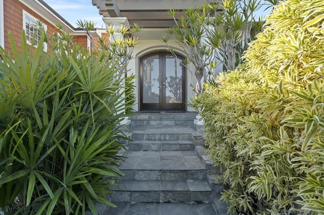 property entrance featuring french doors