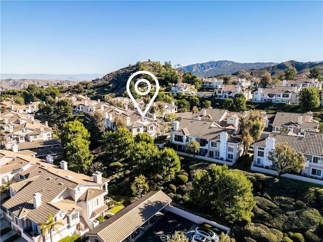 aerial view featuring a mountain view