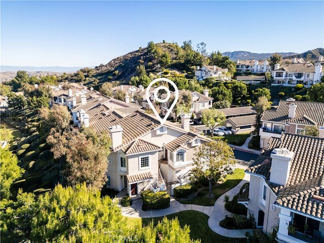 bird's eye view with a mountain view