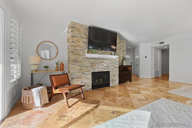 living room with a fireplace