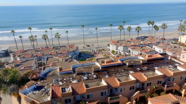 bird's eye view featuring a water view and a view of the beach