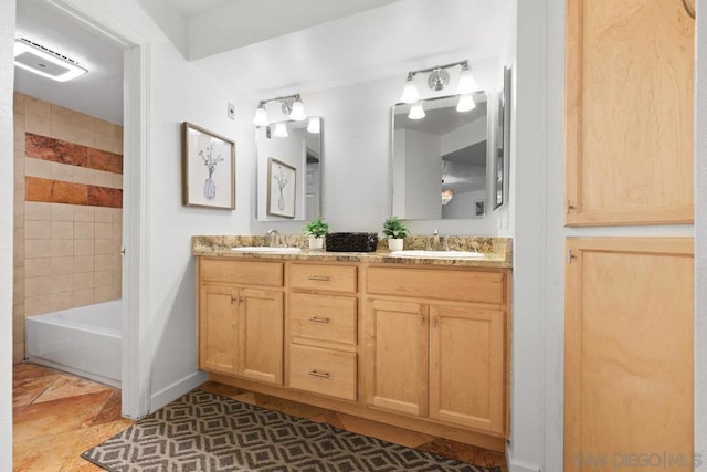 bathroom with vanity and tile patterned floors