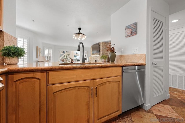 kitchen featuring sink and stainless steel dishwasher