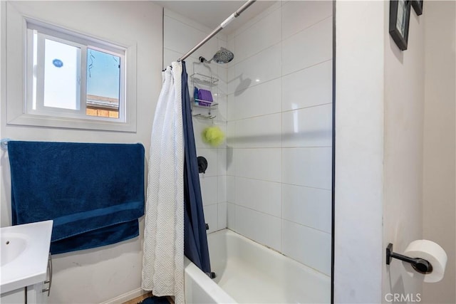 bathroom with vanity and shower / bath combo