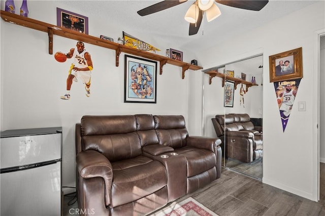 living room with ceiling fan