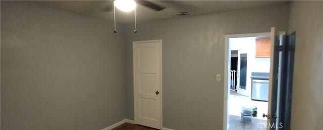 spare room with ceiling fan