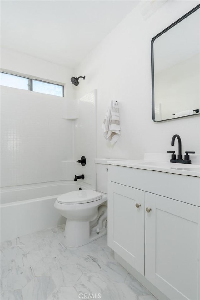 full bathroom featuring toilet, vanity, and shower / tub combination