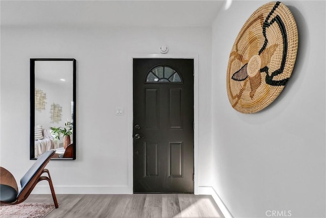 foyer entrance featuring hardwood / wood-style floors