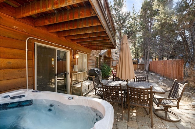 view of patio with a hot tub