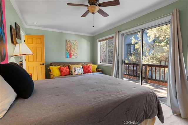 carpeted bedroom featuring ceiling fan, access to exterior, and ornamental molding