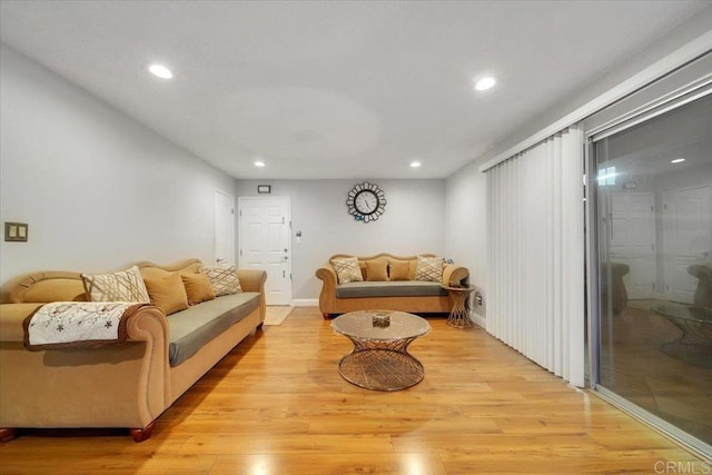 living room with light hardwood / wood-style floors