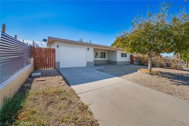 single story home featuring a garage