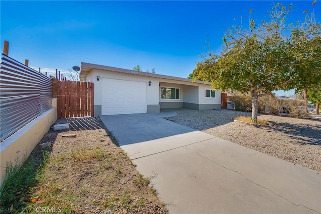 single story home featuring a garage