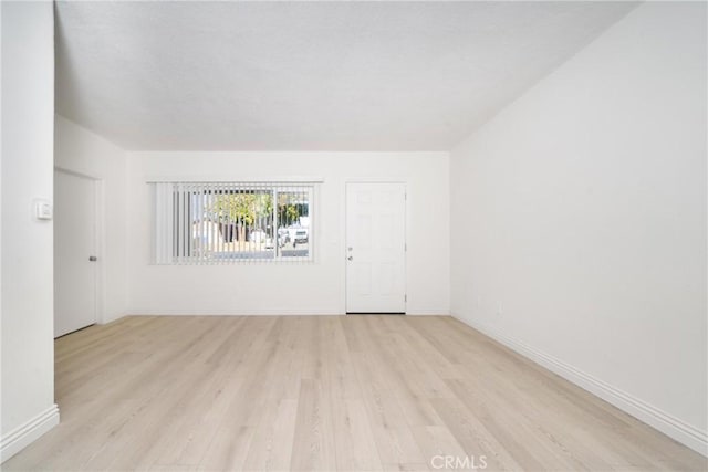 empty room featuring light hardwood / wood-style floors