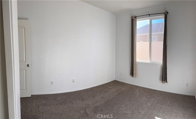 view of carpeted spare room