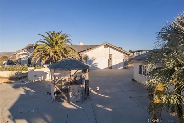 view of front of home featuring a patio