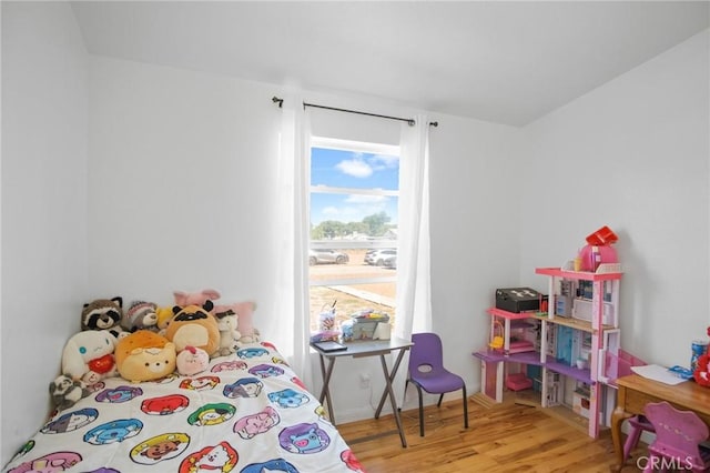 bedroom featuring hardwood / wood-style floors