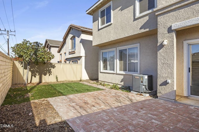 exterior space with central air condition unit