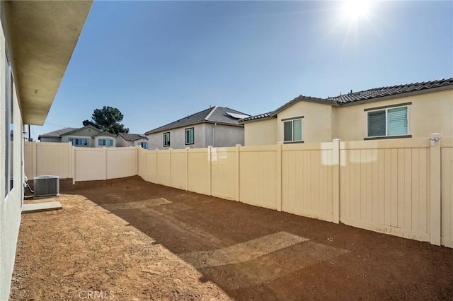 view of yard with central AC