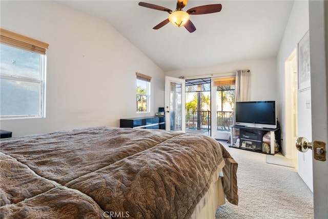 carpeted bedroom featuring ceiling fan, lofted ceiling, and access to outside