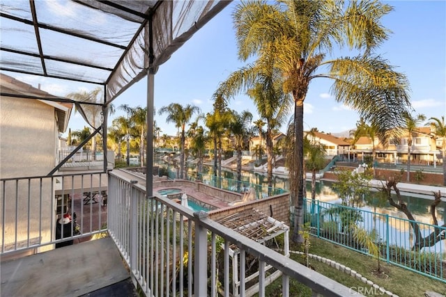 balcony with an in ground hot tub