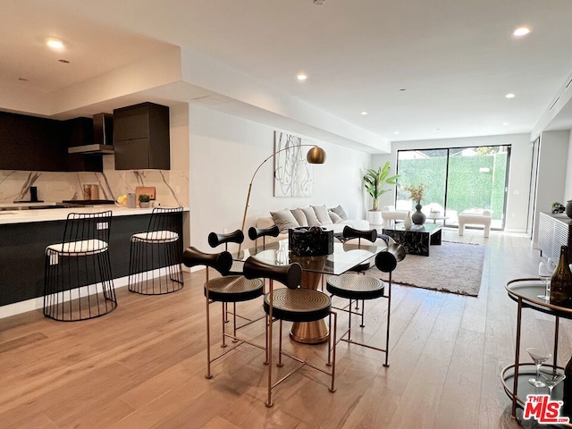 dining room with light hardwood / wood-style floors