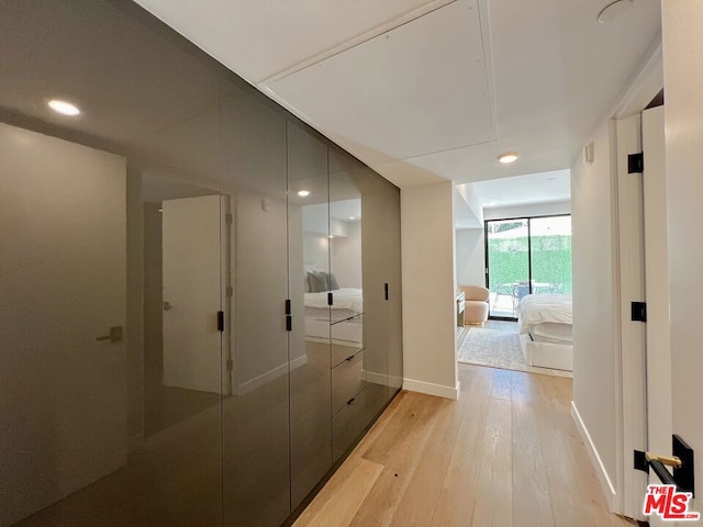 hall featuring light hardwood / wood-style floors