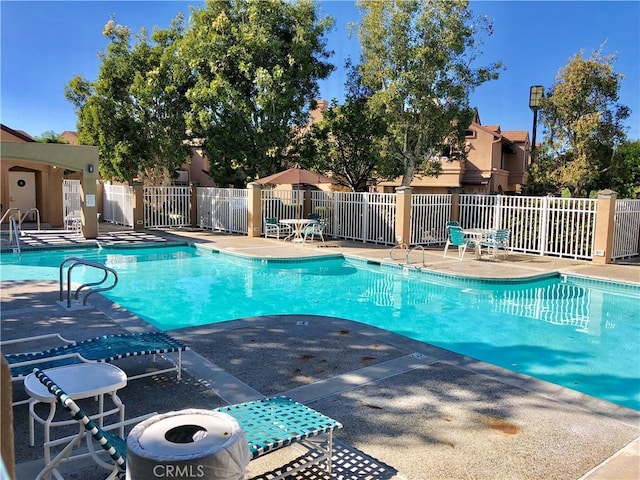 view of pool with a patio area