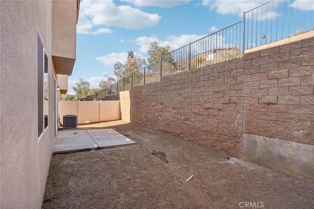 34260 Summer Ln, Yucaipa, CA 92399 - view of yard with fence, a patio area, and central AC