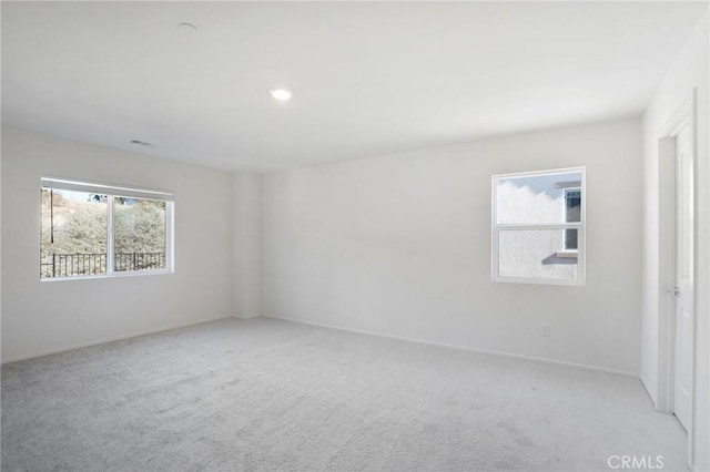 34260 Summer Ln, Yucaipa, CA 92399 - empty room with light colored carpet, baseboards, and recessed lighting
