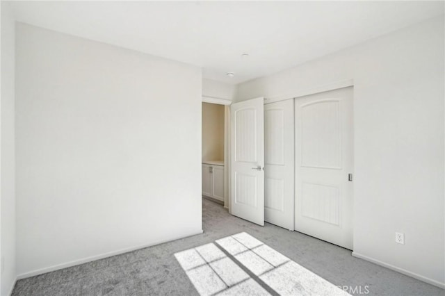 34260 Summer Ln, Yucaipa, CA 92399 - unfurnished bedroom featuring carpet, a closet, and baseboards