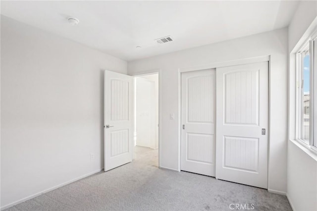 34260 Summer Ln, Yucaipa, CA 92399 - unfurnished bedroom featuring carpet floors, a closet, and baseboards