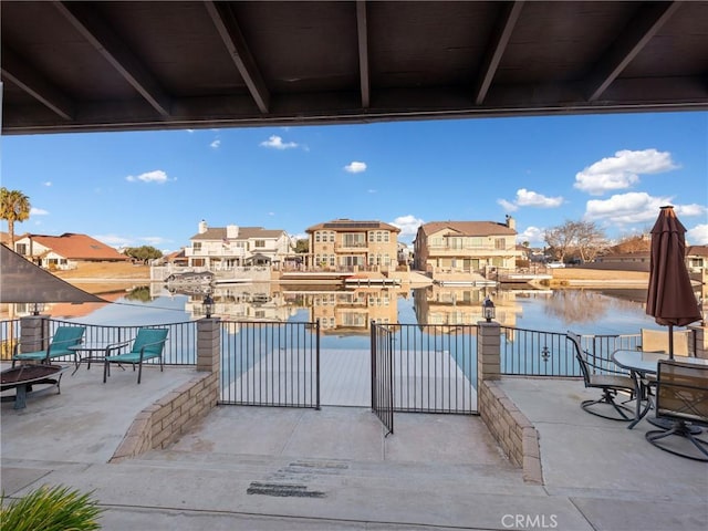 view of patio / terrace featuring a water view