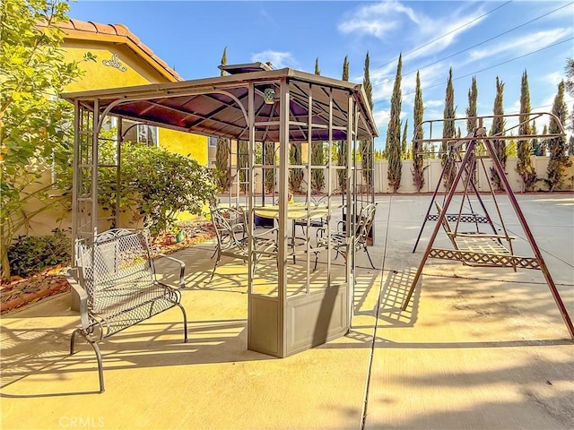 view of patio featuring a playground