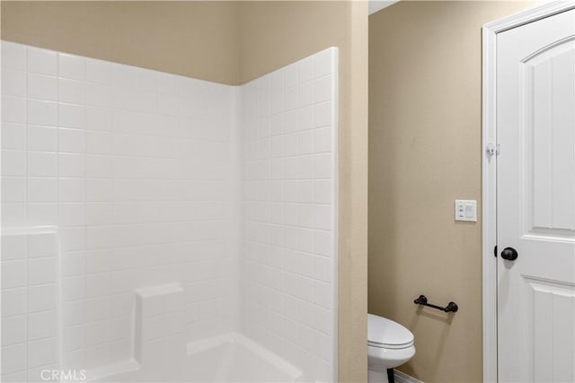 bathroom with toilet and shower with separate bathtub