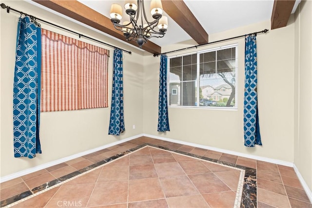 tiled spare room with a chandelier and beamed ceiling