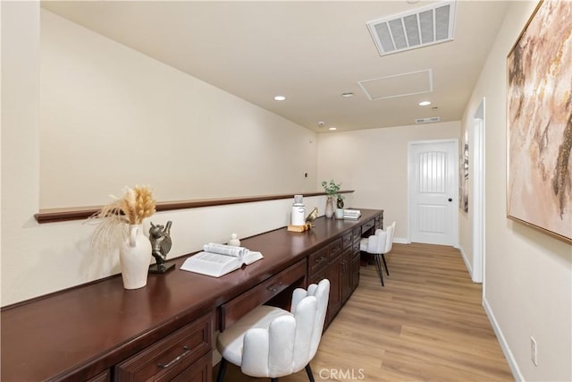 home office with light wood-type flooring