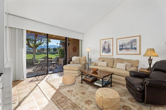 tiled living room featuring lofted ceiling