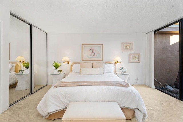 carpeted bedroom with a closet and floor to ceiling windows