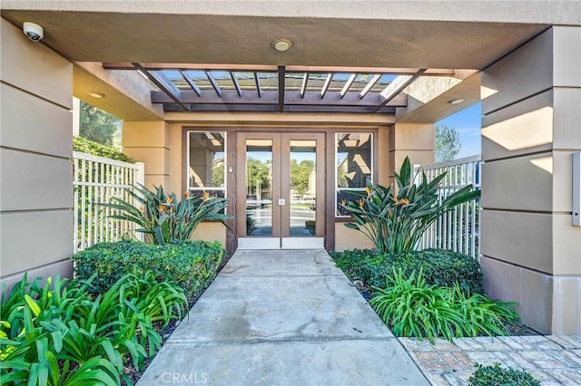 entrance to property featuring french doors