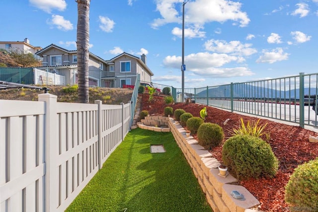 view of yard featuring a water view