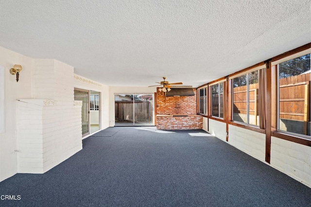 interior space featuring ceiling fan