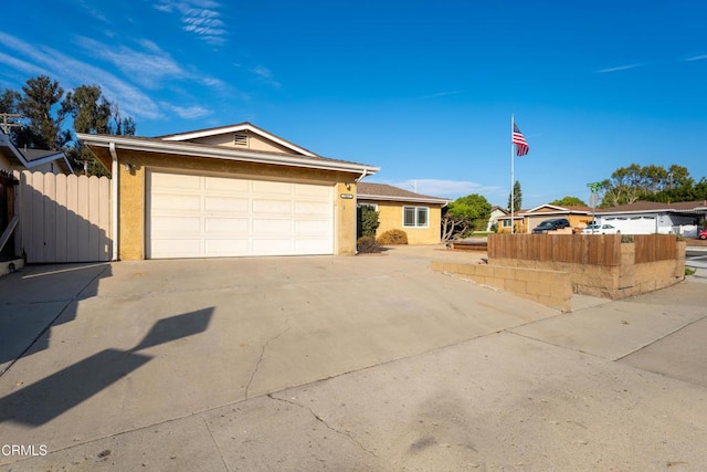 single story home with a garage