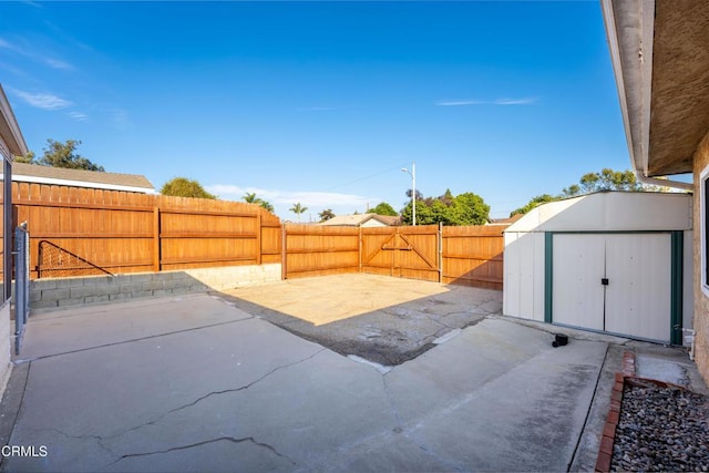 view of patio / terrace with a storage unit